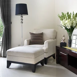 Gray armchair in the bedroom interior