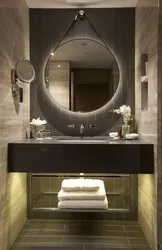 Black mirror in the bathroom interior