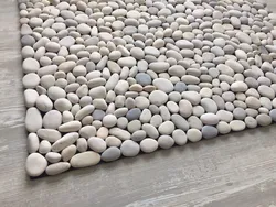 Pebble tiles in the bathroom interior