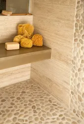 Pebble tiles in the bathroom interior