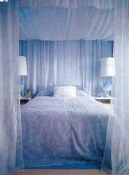 Bedroom Interior With Bed Behind Curtains