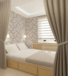 Bedroom interior with bed behind curtains