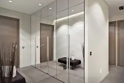 Hallway interior with door with mirror