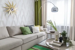 Green-gray wallpaper in the living room interior
