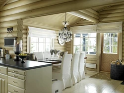 White Kitchen In The Interior Of A Wooden House