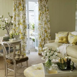 Curtains with roses in the kitchen interior