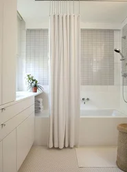 White Curtain In The Bathroom In The Interior