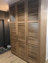 Louvered door to the dressing room in the interior