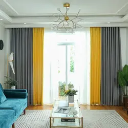 Желто серые шторы в интерьере гостиной