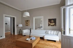 Интерьер гостиной серый пол белые стены