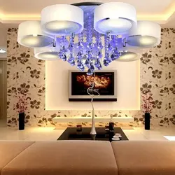 Chandelier with flowers in the living room interior