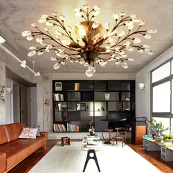 Chandelier with flowers in the living room interior