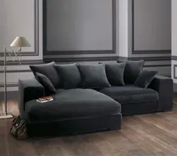 Velor corner sofa in the living room interior