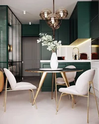 Green chairs in the interior of a gray kitchen