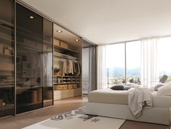 Bedroom interior with floor-to-ceiling windows