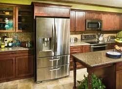 Refrigerator and stove in the kitchen interior