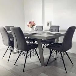 Gray table and chairs in the kitchen interior