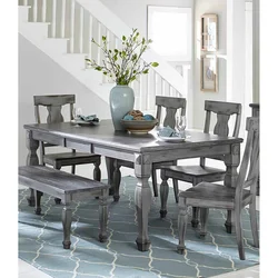 Gray table and chairs in the kitchen interior