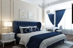 Curtains in the interior of a bedroom with a blue bed