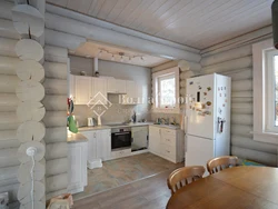 White Kitchen Interior In A Timber House