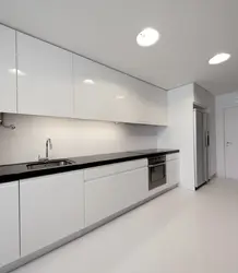 Kitchen without handles white glossy in the interior