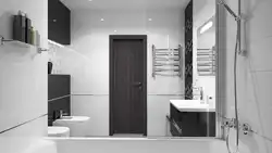 Bathroom interior with gray and black tiles