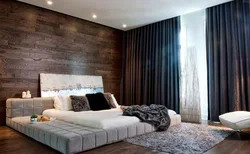 Gray laminate on the wall in the bedroom interior