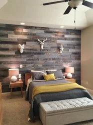 Gray laminate on the wall in the bedroom interior