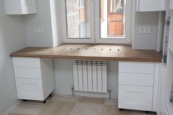 Design built-in table in the kitchen
