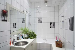 White tiles in the bathroom with black grout photo in the interior