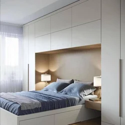 Bedroom design with built-in wardrobe and bed