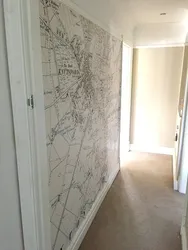 World map decorative plaster in the hallway interior