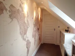 World map decorative plaster in the hallway interior