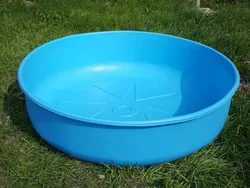 Plastic bathtub for a summer residence photo