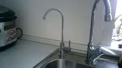 Kitchen taps with water filter photo