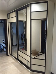 Wardrobe in the hallway with a mirror inexpensive photo