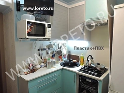 Kitchen in Khrushchev with dishwasher and refrigerator photo