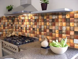 Self-adhesive panels for walls in the kitchen interior photo