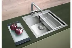 Kitchen Sinks Built Into A Stainless Steel Countertop Photo