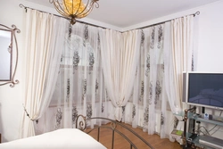 Photo of curtains for the bedroom on the ceiling cornice