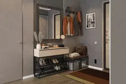 Hallway design with cabinet and mirror
