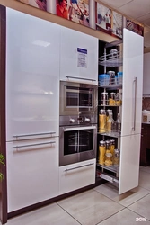 Photo of a kitchen with a pencil case and a refrigerator photo