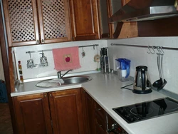 Corner kitchen with railing photo