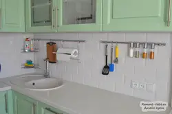 Corner kitchen with railing photo