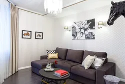 Dark Sofa In The Interior Of A Bright Living Room