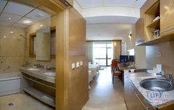 Hotel room design with kitchen