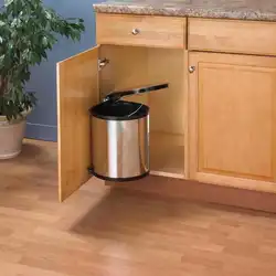 Trash can in the kitchen interior