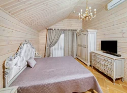 Дизайн спальни в доме из клееного бруса