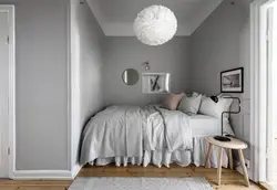 Bedroom interior with bed against the wall