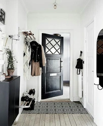 Black wardrobe in the hallway interior